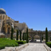 The southern wall of the Temple Mount in Jerusalem beneath a clear blue sky, illustrating the historical and political setting of the Israel–Palestine conflict.